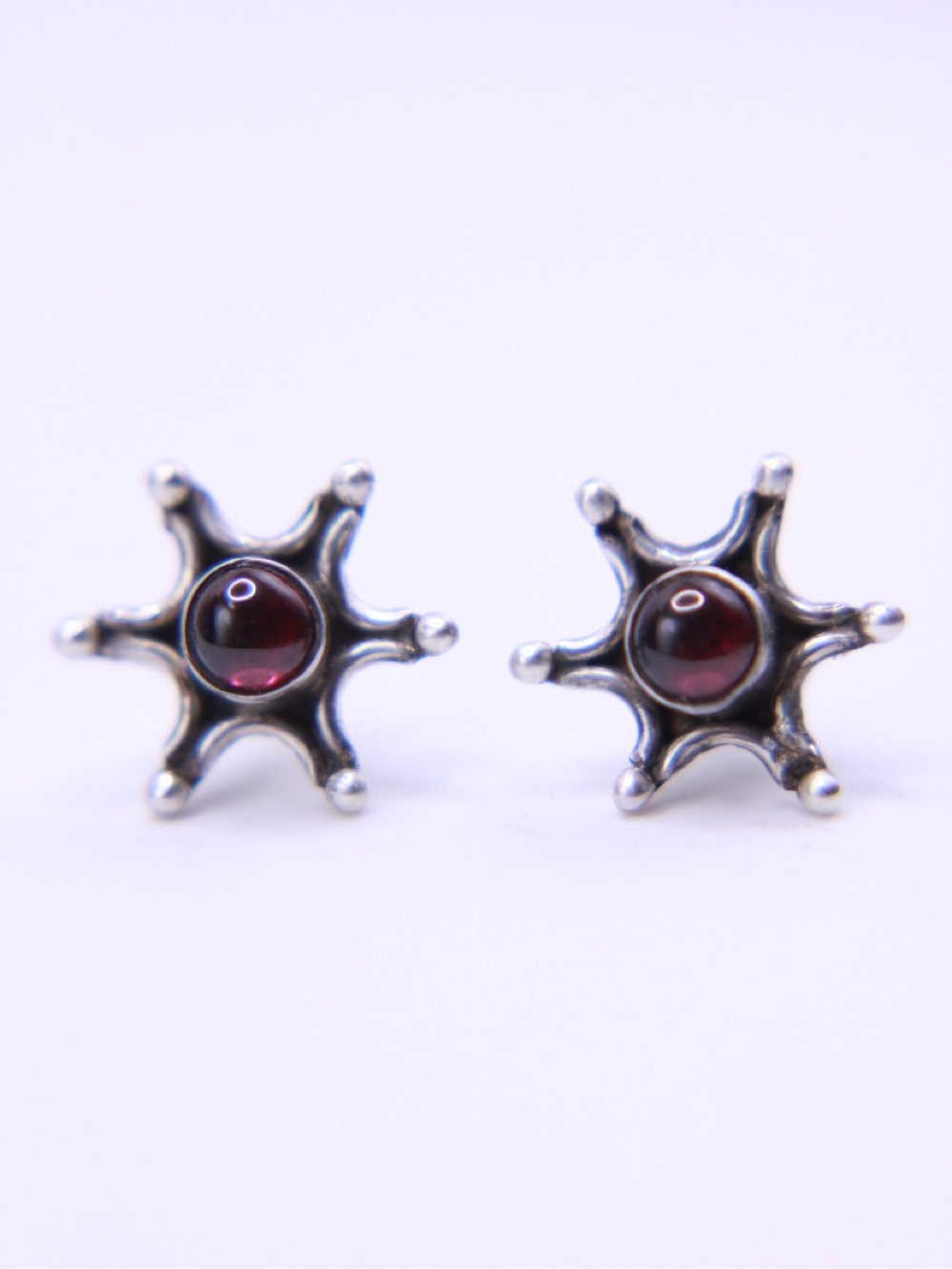 Vintage Sterling Silver Starburst Stud Earrings Featuring Red Garnet Gemstones